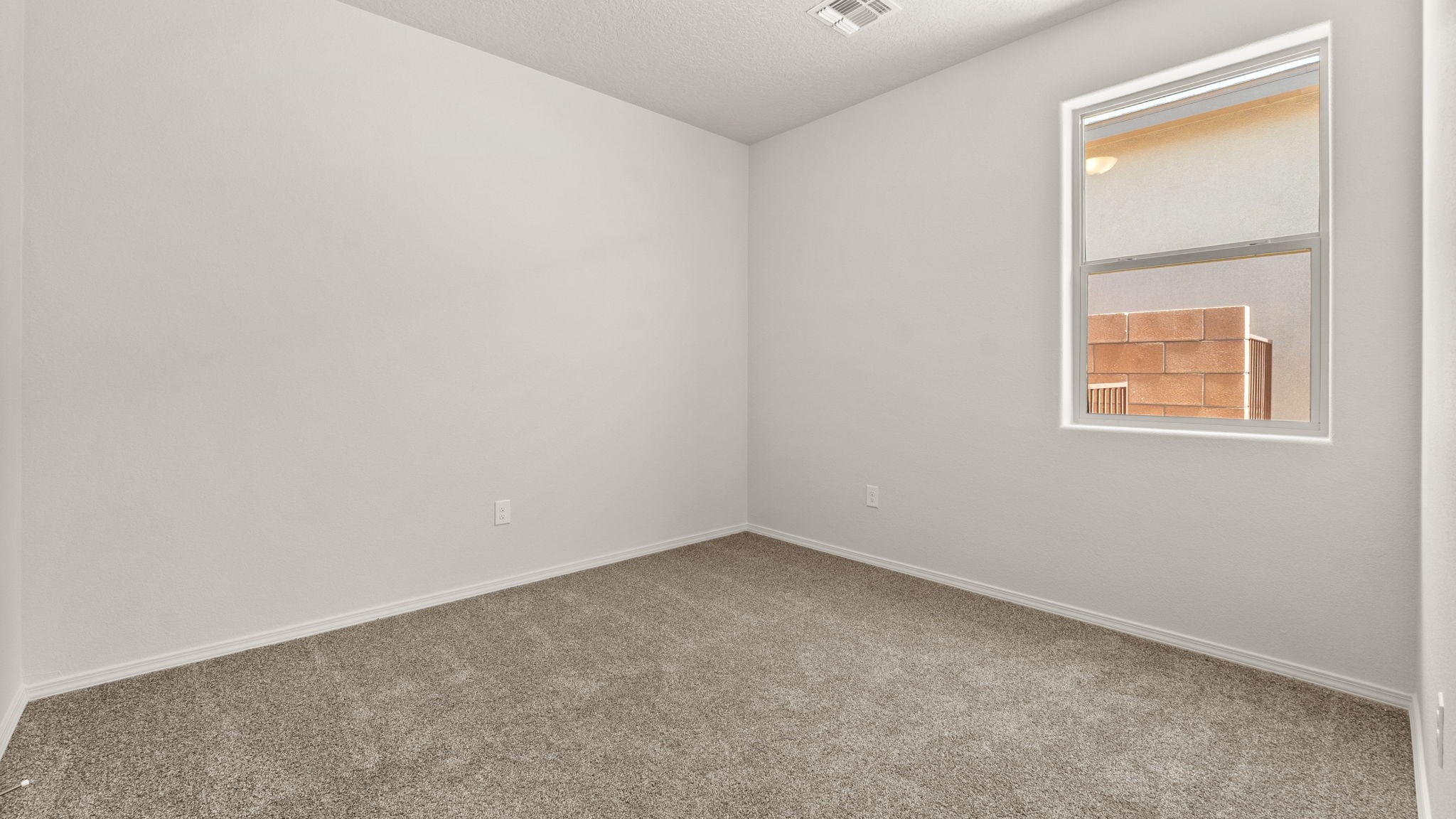 Primary bedroom with optimized layout and private flow to your ensuite and walk-in closet at Vista Grande