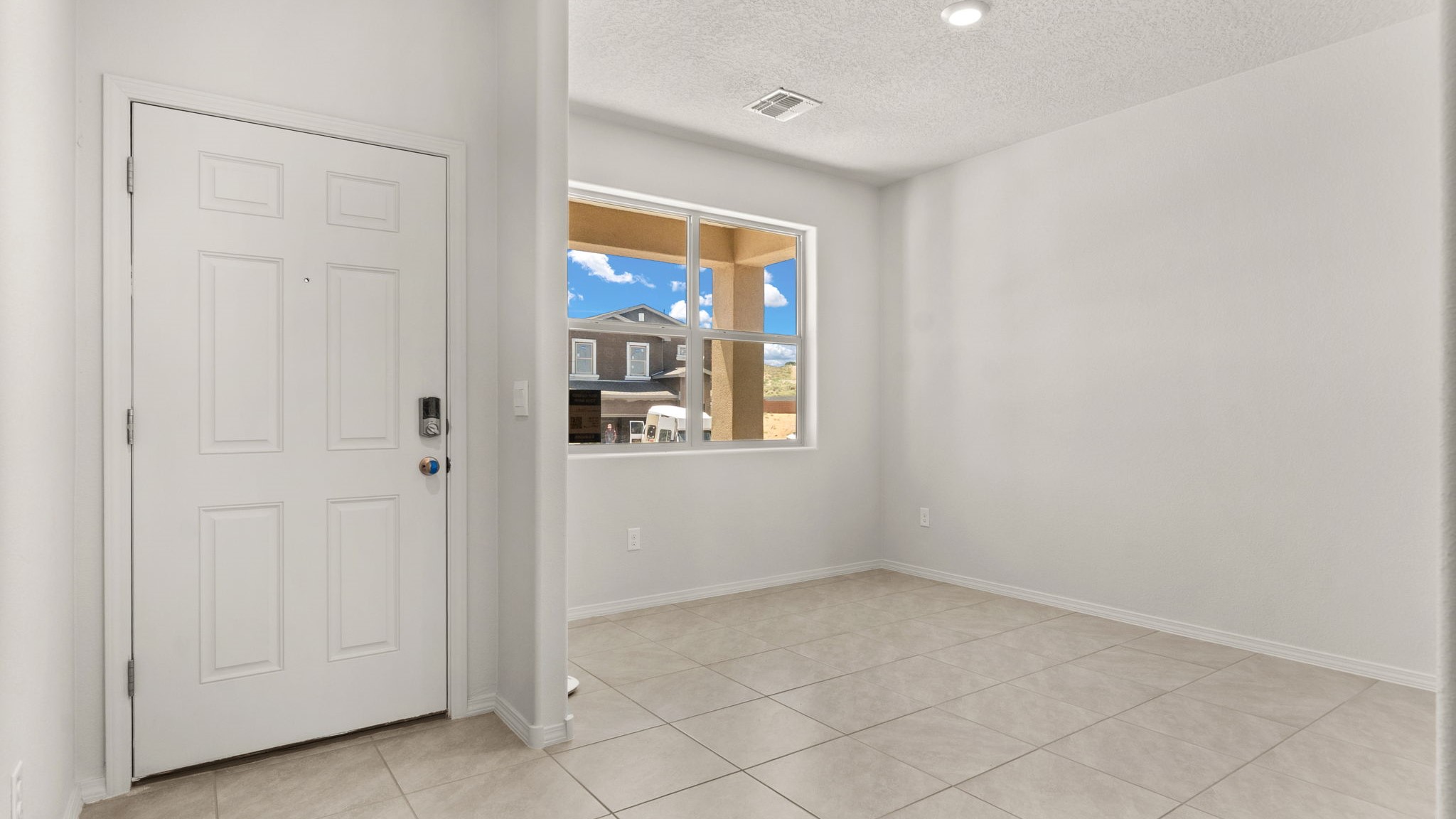 Foyer offering a bright transition into the home’s main gathering areas at Vista Grande