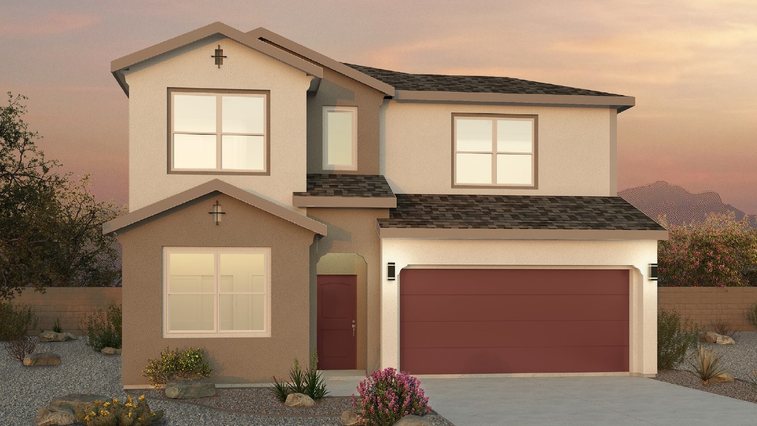 Two story home with a brown exterior and a two car garage.