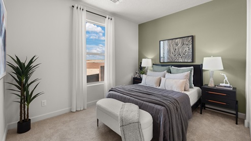 Bedroom 2 with one window, carpet, and closet with sliding doors