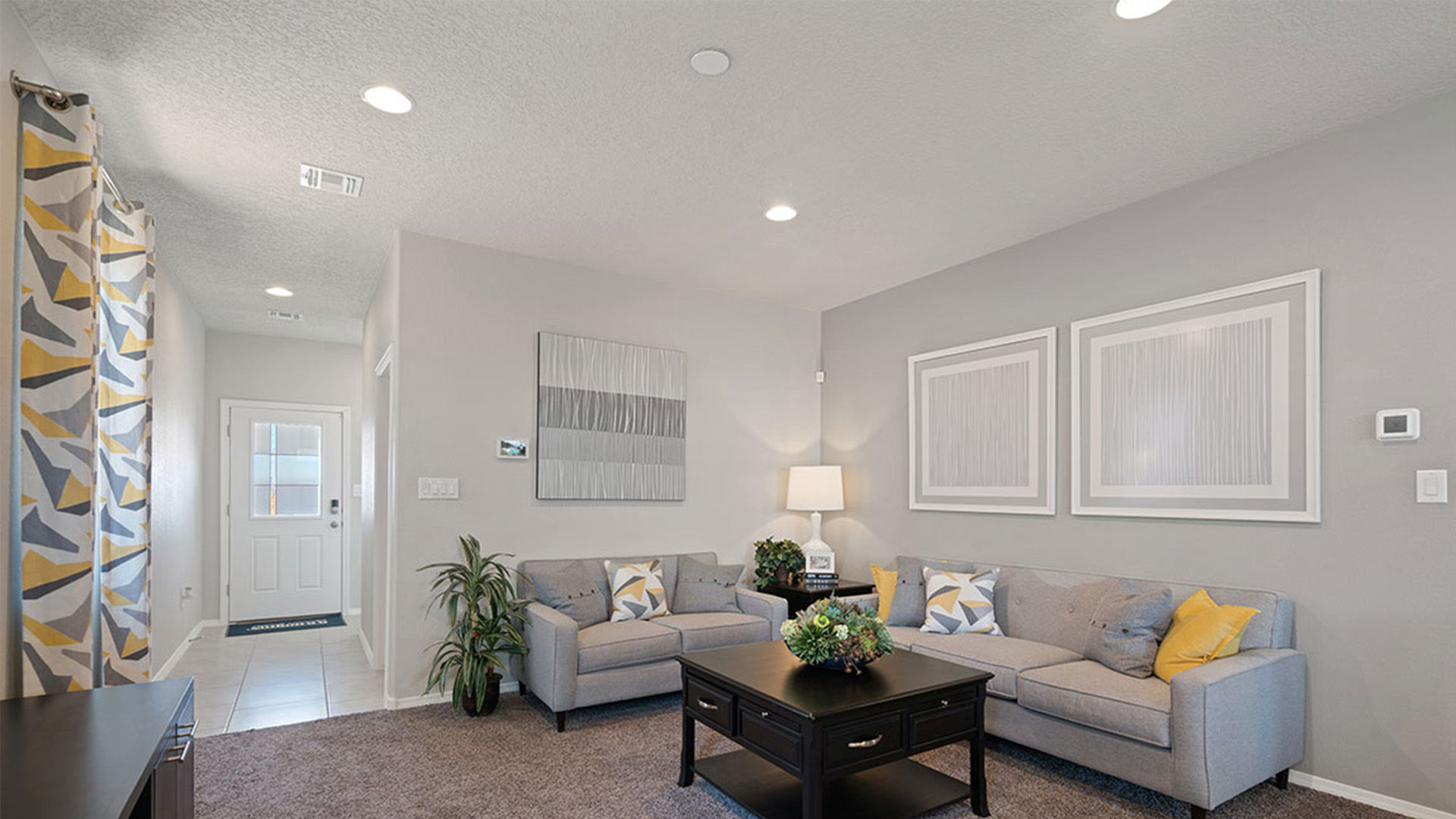 Living room near outside access with clear view toward backyard area at Los Diamantes Phase III