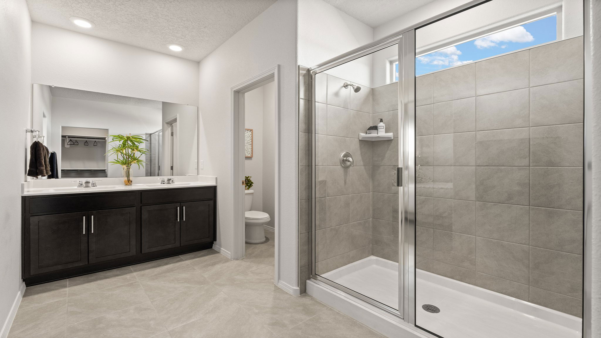 Interior bathroom with double sink and shower