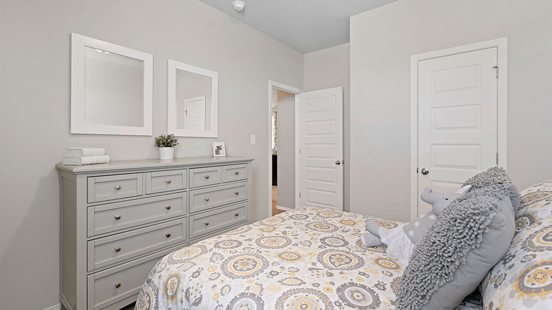 Front-facing flex room in this D.R. Horton home perfect for an office library or guest retreat