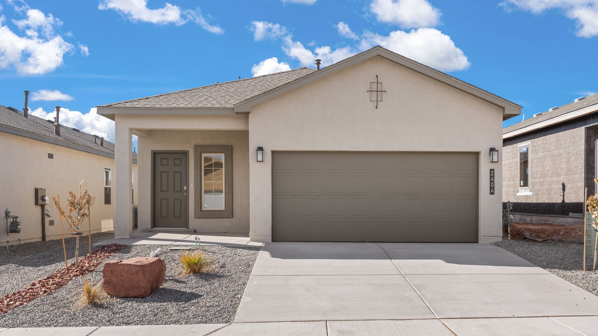 1505 Calle Oeste NW, Los Lunas, NM, Fiesta Del Norte By D.R. Horton 1-story new home, 3-bed, 2-bath, 2-car, front street view