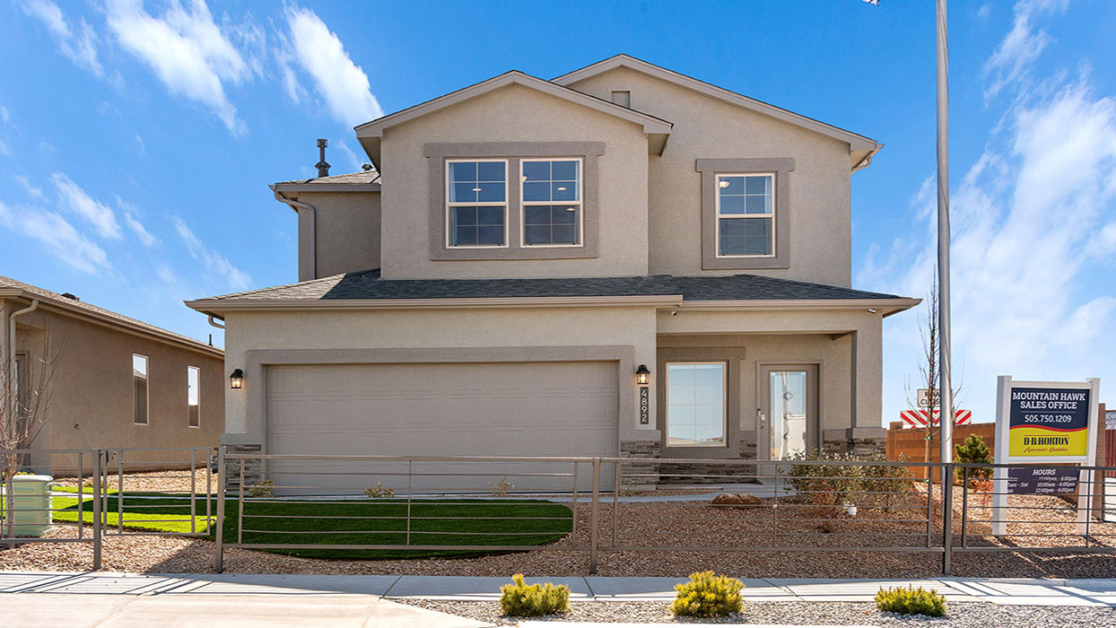 Exterior two-story home with stone detailing