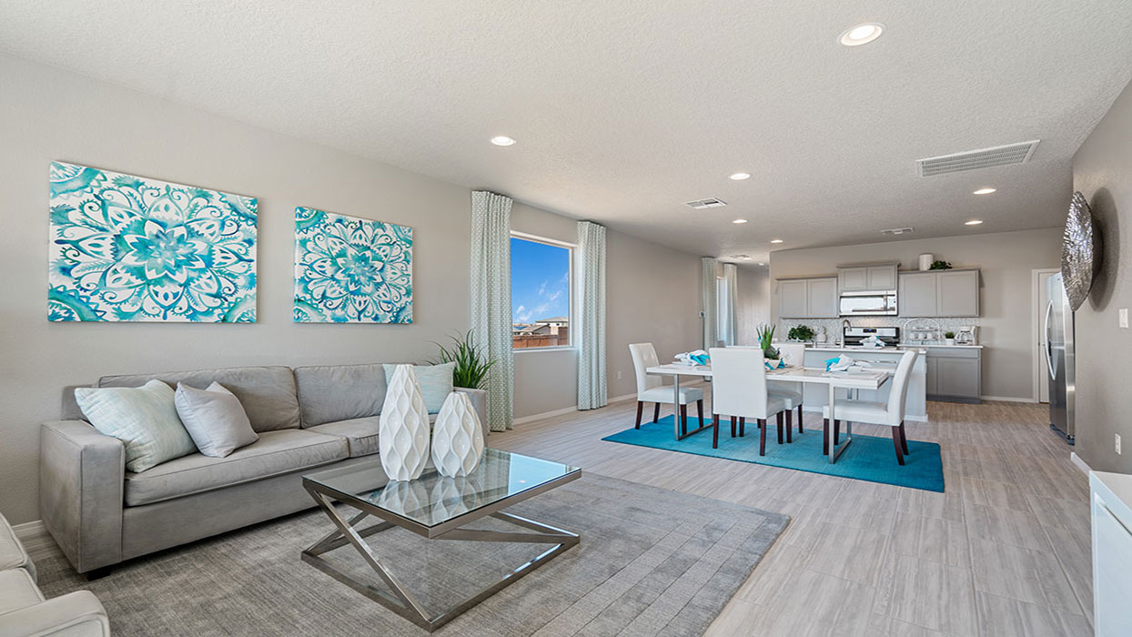 Interior living area open to dining area and kitchen