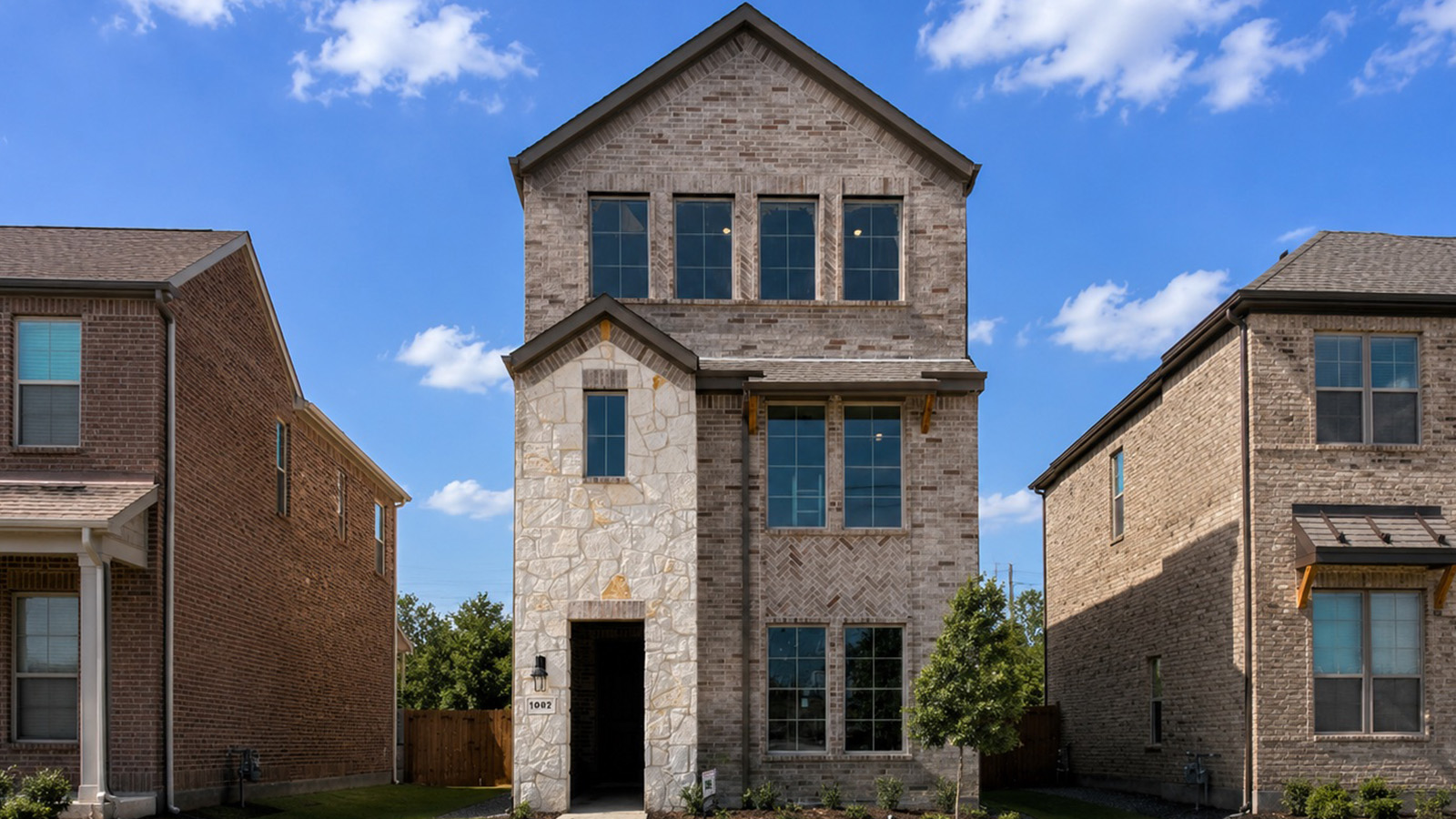 Exterior three-story new construction home in DFW