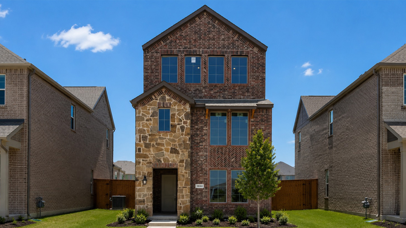 Exterior three-story new construction home near DFW airport.