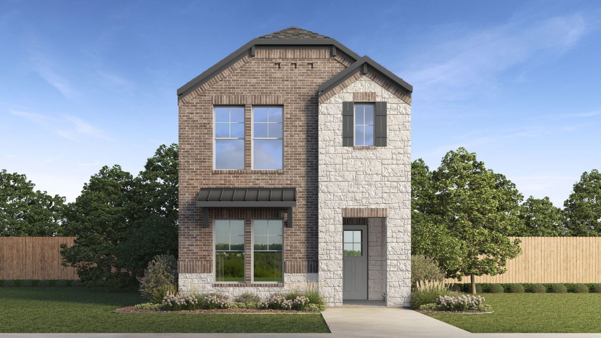 Two story new build home with stone and clean landscaping.