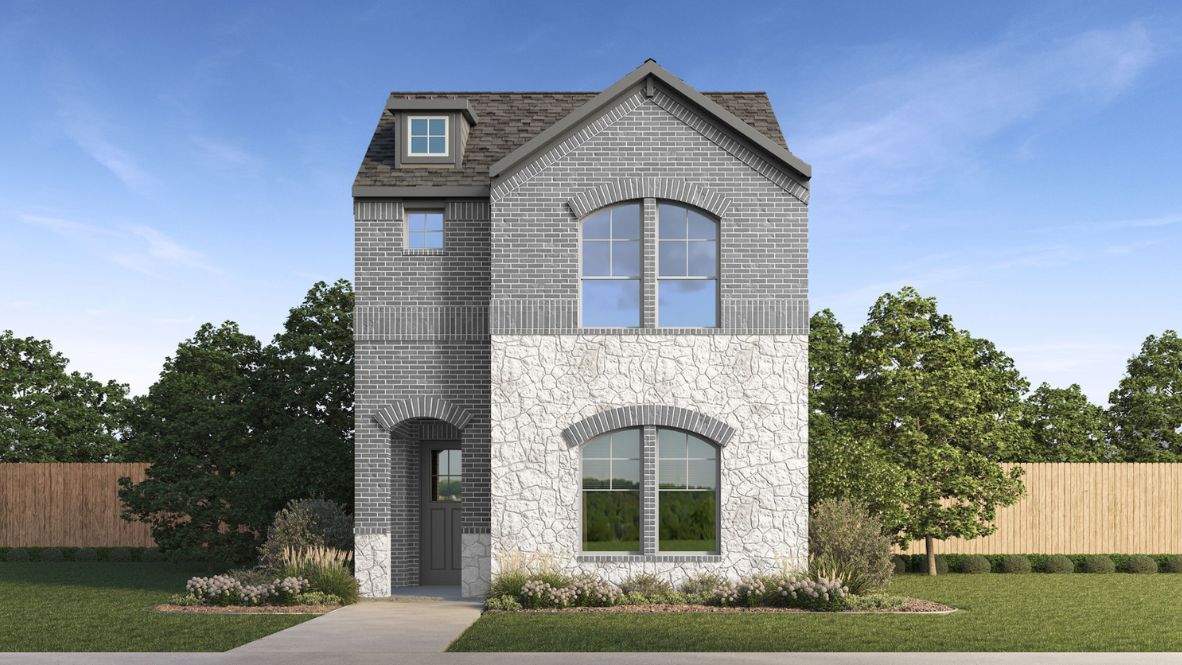 Two story new build home with light colored stone and clean landscaping.