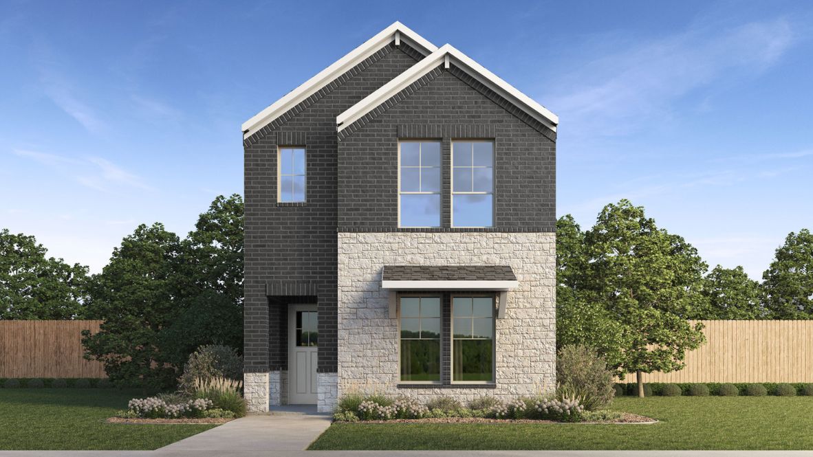 Two story new build home with dark stone and clean landscaping.