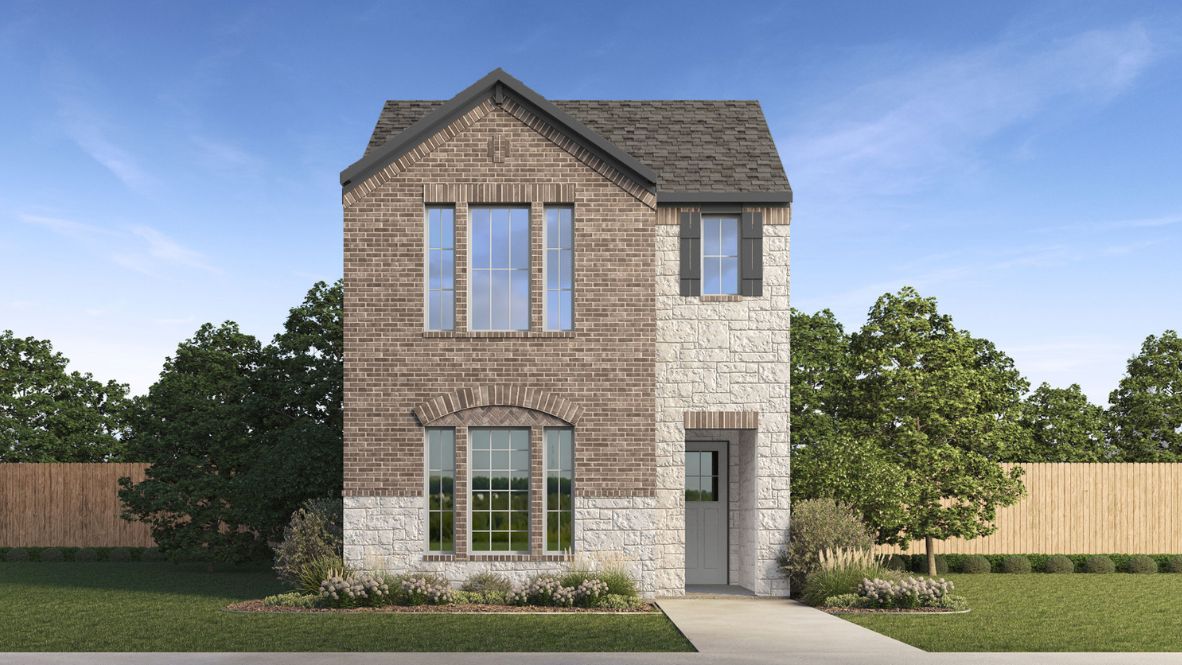 New home with brick accents and attached garage.