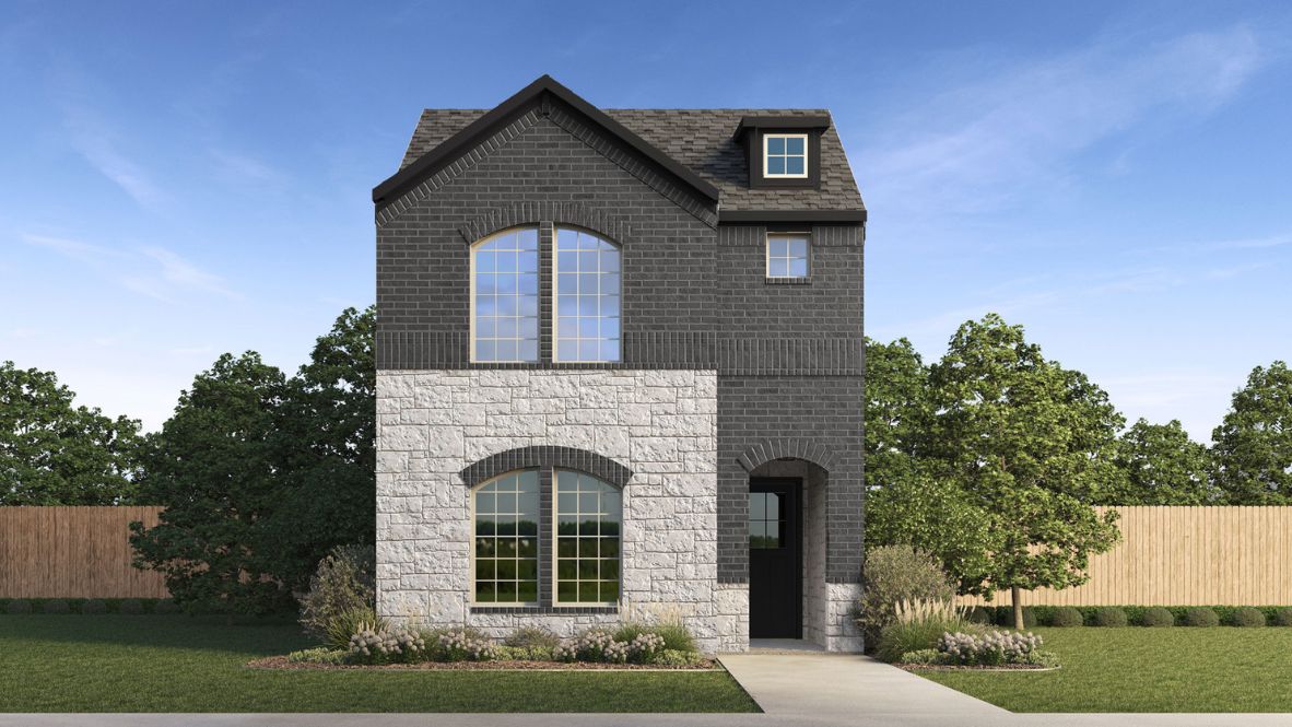 Two story new build home with dark stone and clean landscaping.