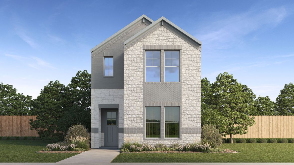 Two story new build home with light colored stone and clean landscaping.