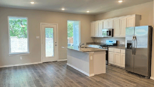Kitchen with Island and white cabinets