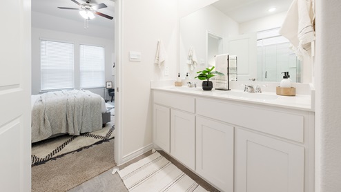 Interior bathroom with large vanity and two sinks