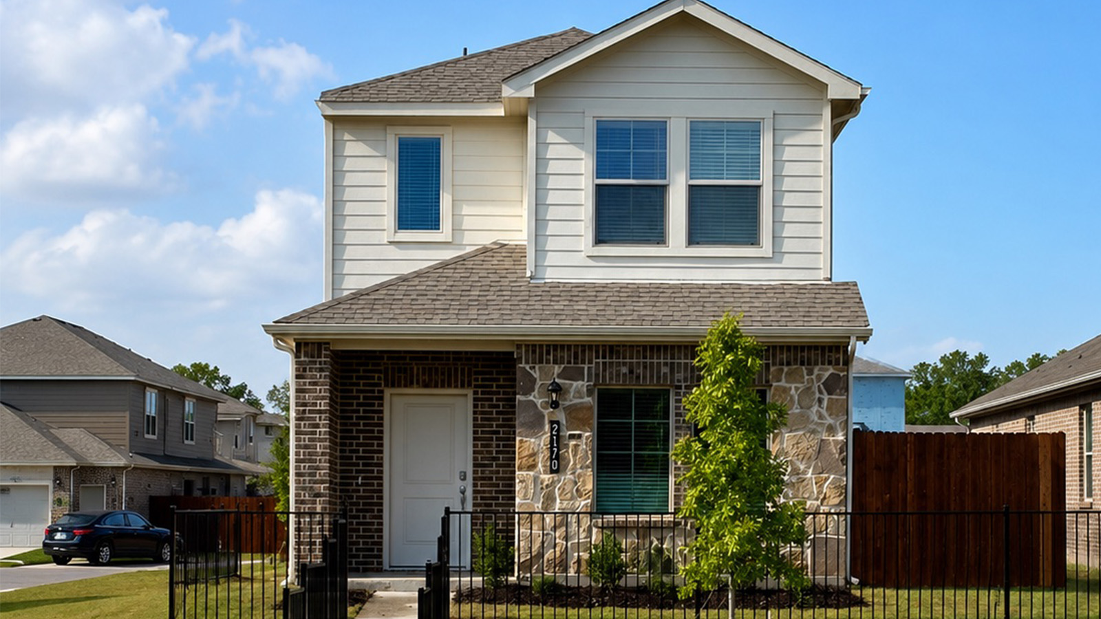 Exterior two-story brick house in arlington,texas