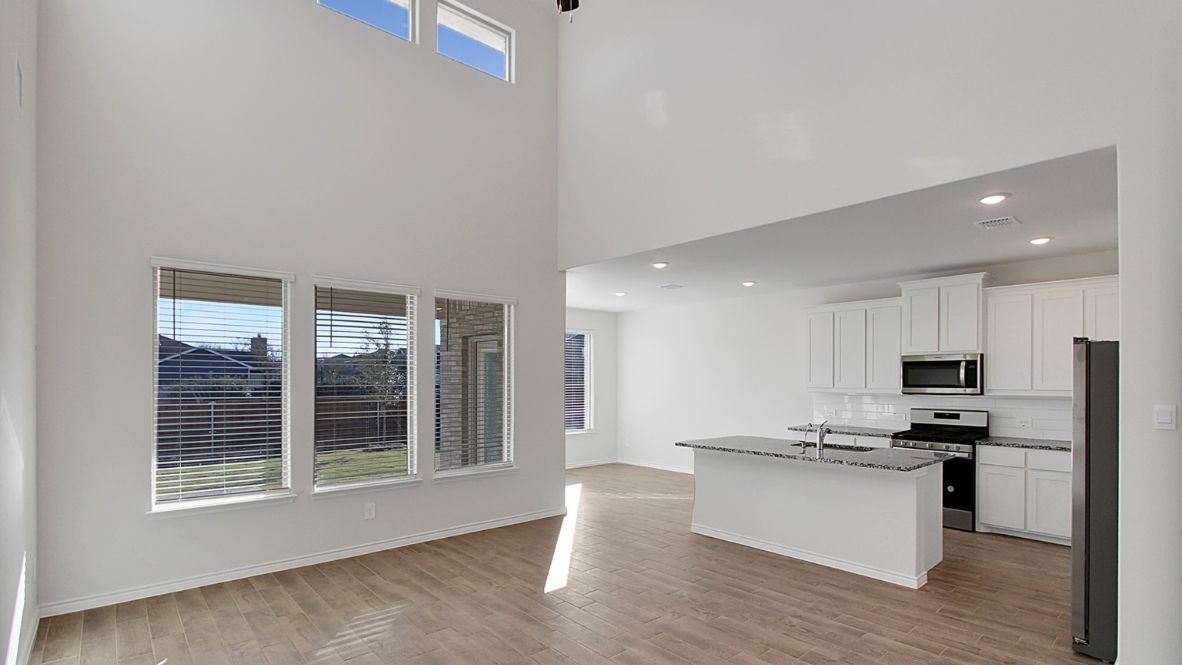 spacious open-concept first floor kitchen and living room