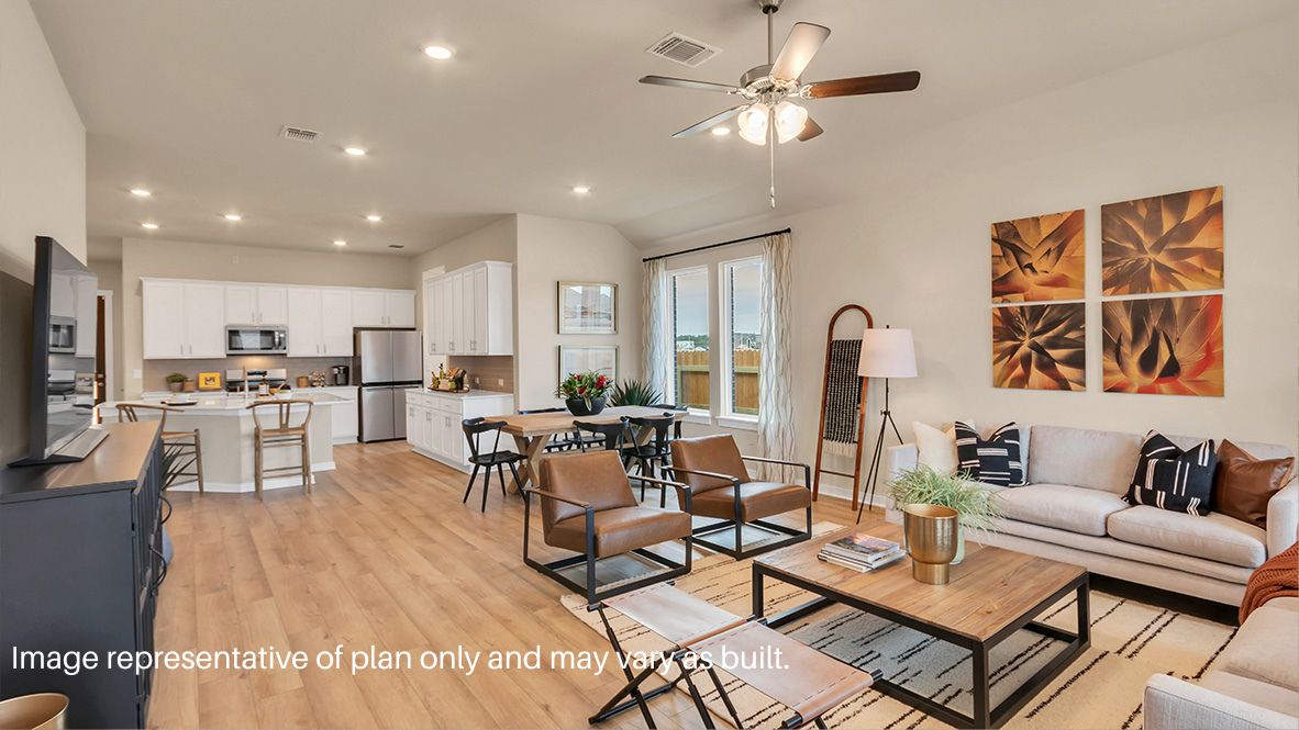 Expanded view from the family room to the dining room and the kitchen.