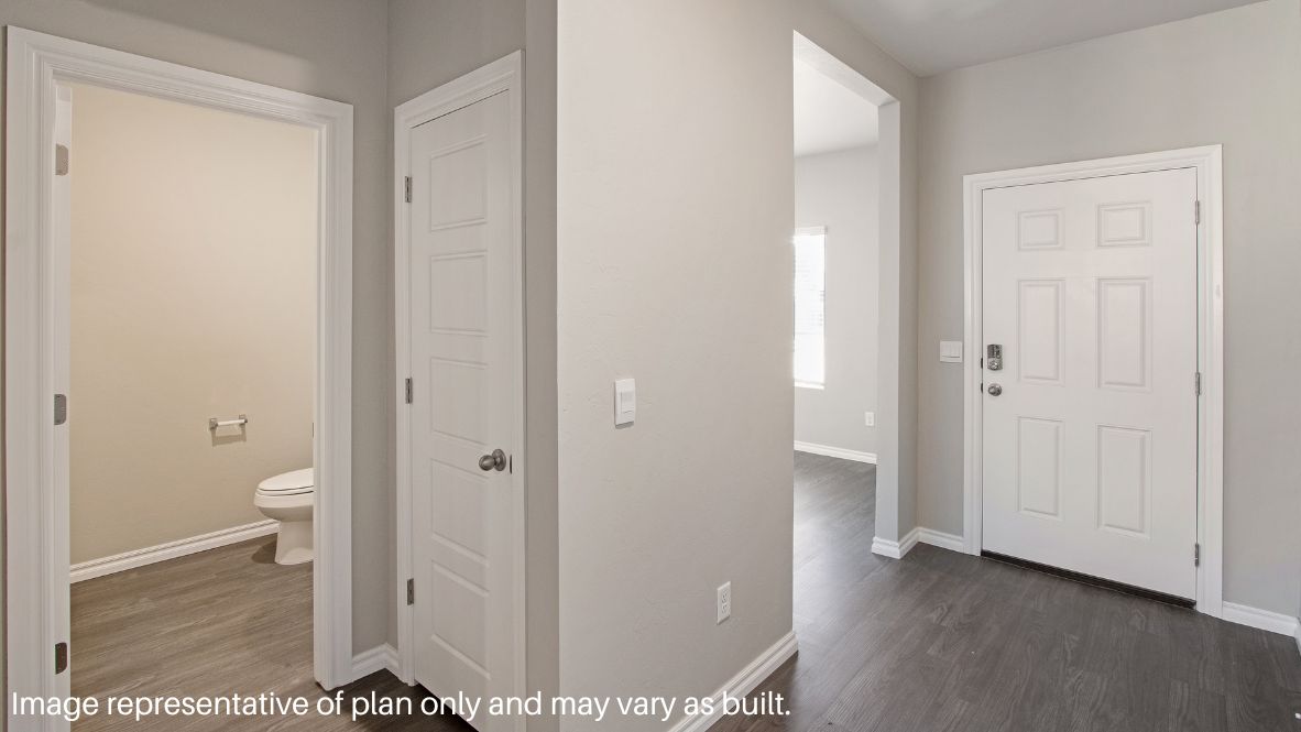 As you enter the home, you will notice the beautiful study by the front of the house. The study has vinyl flooring, two large windows that illuminate the room, and a storage closet. It is the perfect space for an office or library.