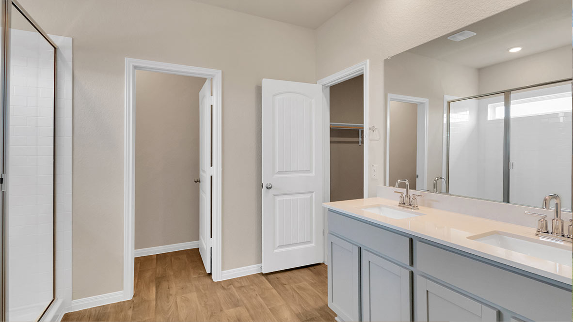 Primary bathroom with double vanities