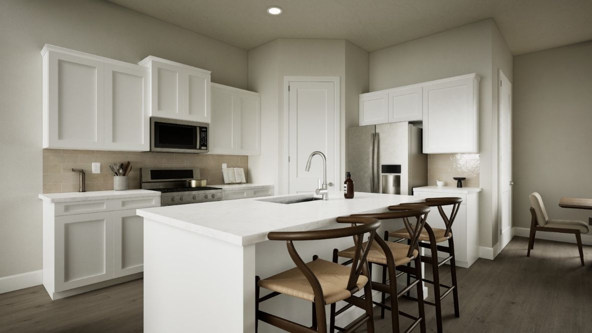 Kitchen with island and white cabinets
