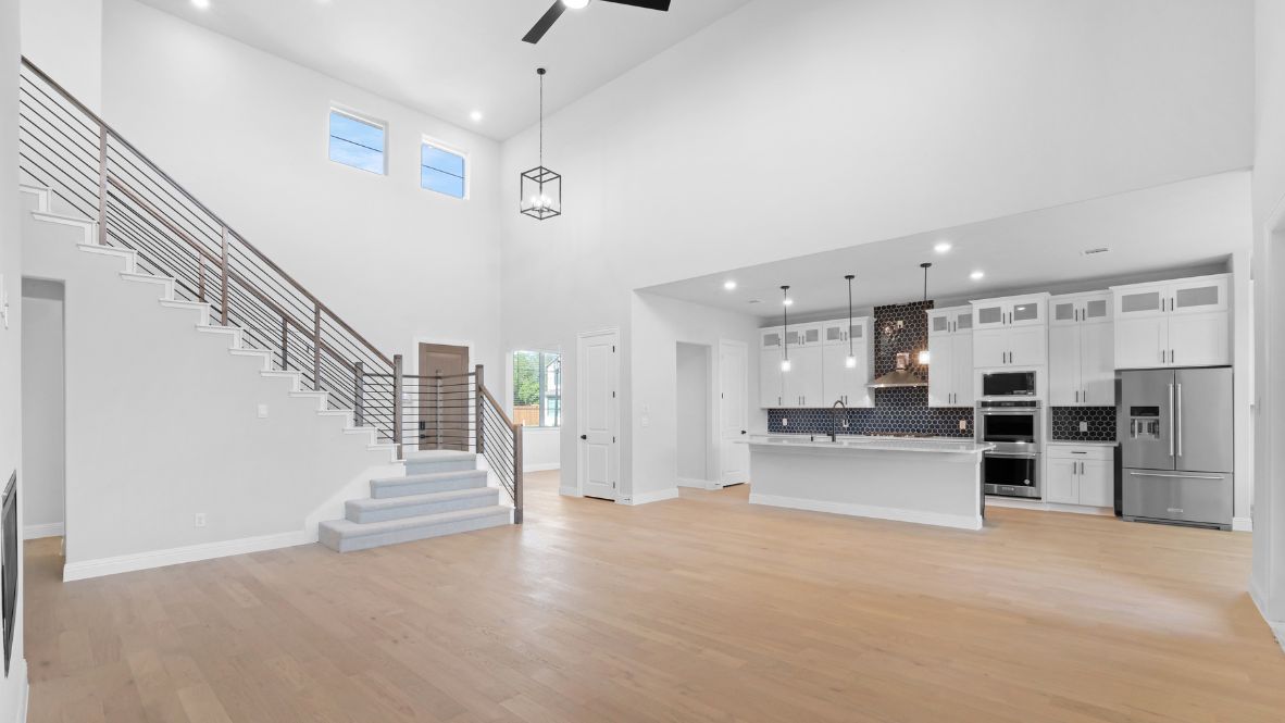 Living room area connecting to the kitchen.