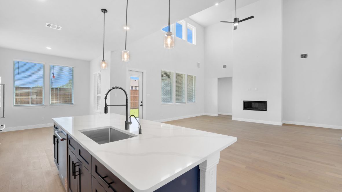 Large kitchen island facing the living room area.