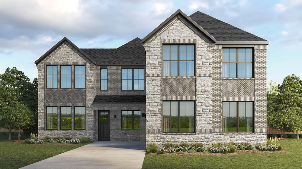 Two story home with brick and stone exterior and two car garage