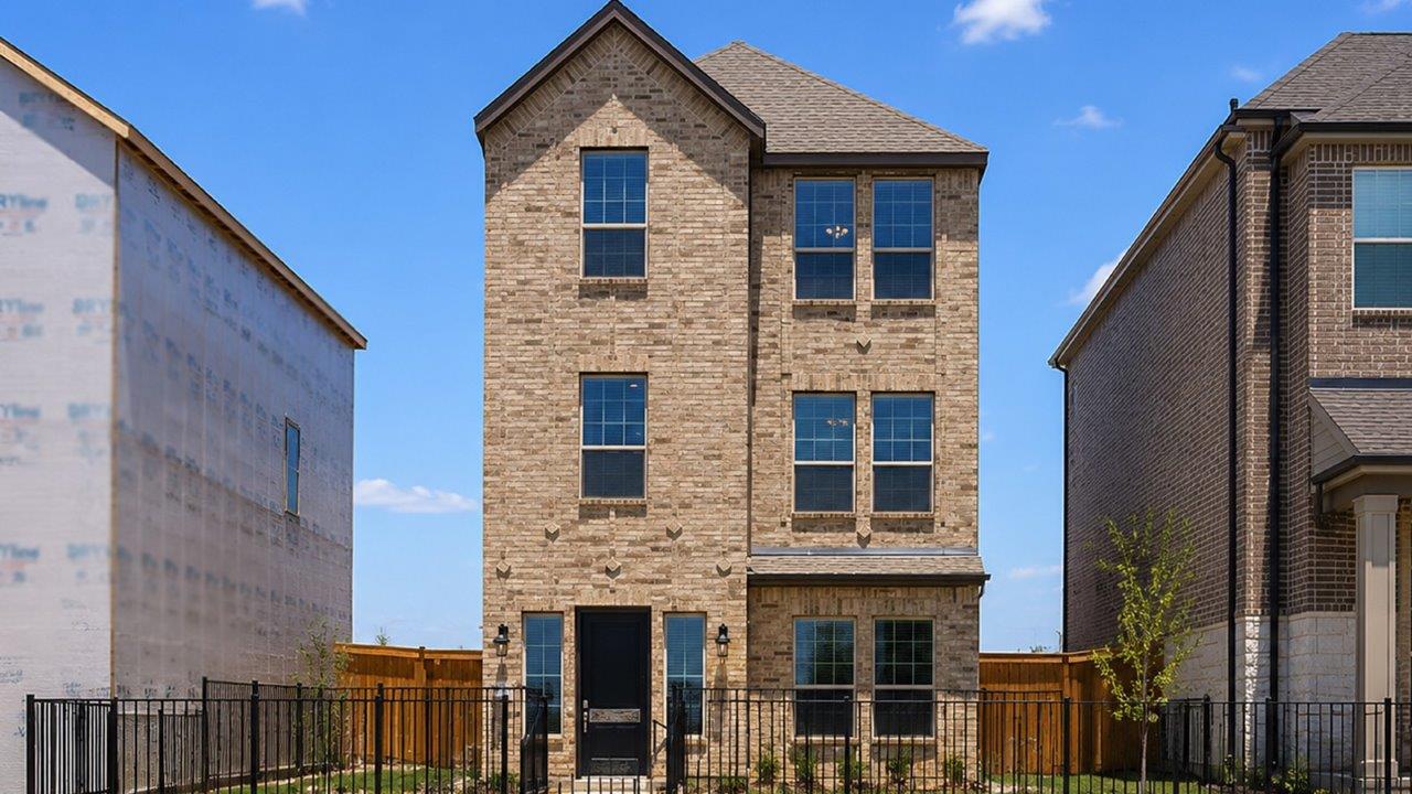 Exterior three-story new construction home in plano, texas.