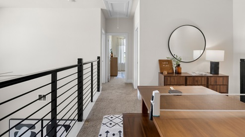Interior upstairs loft area open to hallway