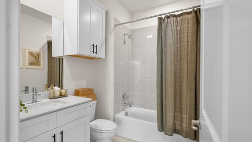 Interior bathroom with full-sized shower and sink