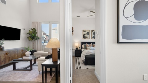 main living floor leading to secondary bedroom on first floor