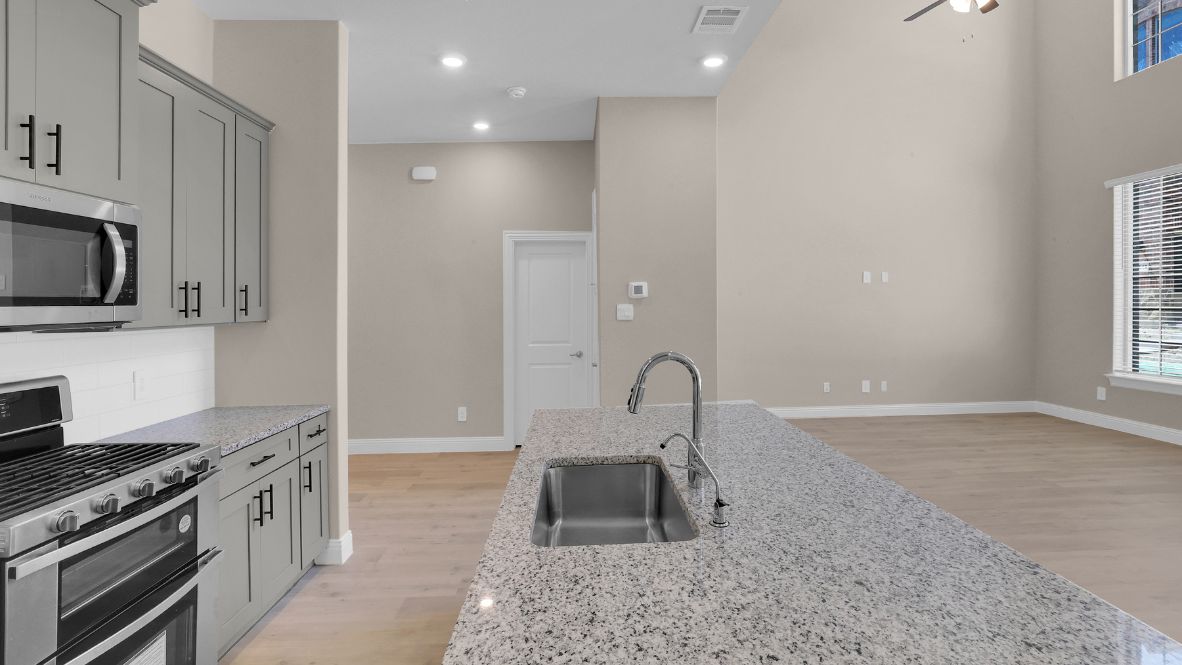 Explore the Longhorn Floor Plan at Mustang Square in Plano, TX  Introducing the Longhorn, a beautifully designed 4-bedroom, 3.5-bathroom, 3-story home with 2,223 sq. ft. of spacious and modern living. The striking brick exterior, expansive windows, and sophisticated architectural details create unmatched curb appeal. Located in The Avenue, this home offers a rear-entry garage and a charming greenway-facing front, blending privacy with vibrant community living.  Step through the front door into a bright, open-concept living space, where natural light highlights the picture-frame cabinetry, stainless steel appliances, and quartz or granite countertops in the chef-inspired kitchen. The first floor features a welcoming family and dining area, along with a powder bath for guests.  On the second floor, you’ll find two spacious bedrooms, including a luxurious primary suite with a spa-like bath and large walk-in closet. The open-to-below design creates an airy, grand feel. The third floor offers two additional bedrooms and a game room, perfect for entertainment or a private retreat.  Ideally located just off Sam Rayburn Tollway at Hillcrest Rd. in the heart of thriving Collin County, residents have access to shopping, dining, recreation, and entertainment to their heart’s content. A shorter daily commute will increase time with family and friends enjoying all this Plano community in Frisco ISD has to offer.