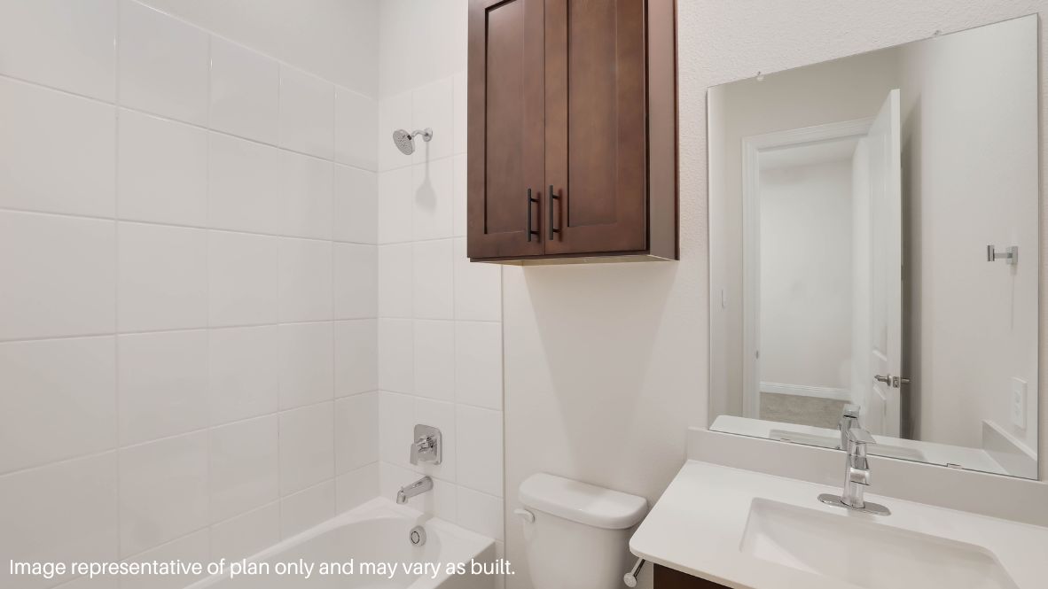 A private guest suite on the main level provides flexibility, while the second floor boasts a luxurious primary suite with a walk-in closet, spa-like en-suite bath, and an additional bedroom with its own full bath.