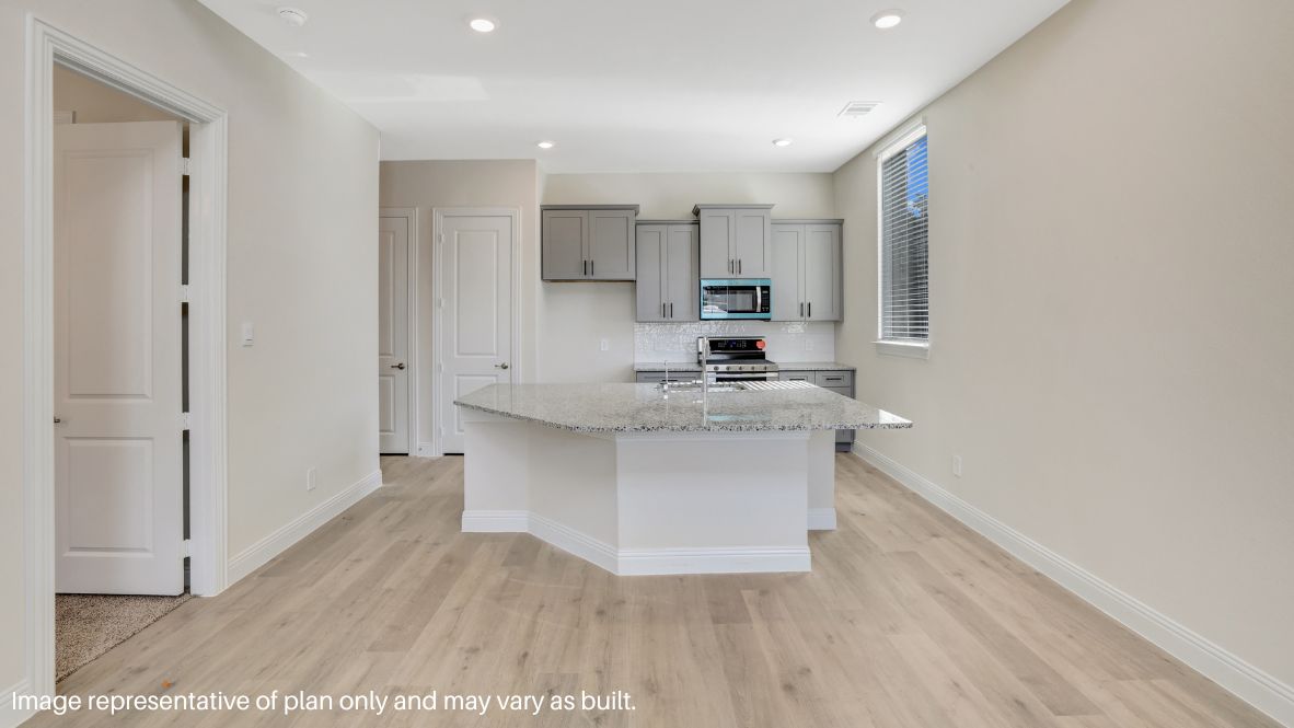 Step into the Maverick, a beautifully designed 4-bedroom, 3.5-bathroom, 2-story home with 1,752 sq. ft. of modern elegance. This stunning home boasts an elevated exterior with brick detailing, oversized windows, and a charming front entry, creating a timeless curb appeal. Located in The Avenue, a vibrant mixed-use community, homes feature a rear-entry garage and overlook a lush greenway, offering a unique urban-meets-suburban feel.