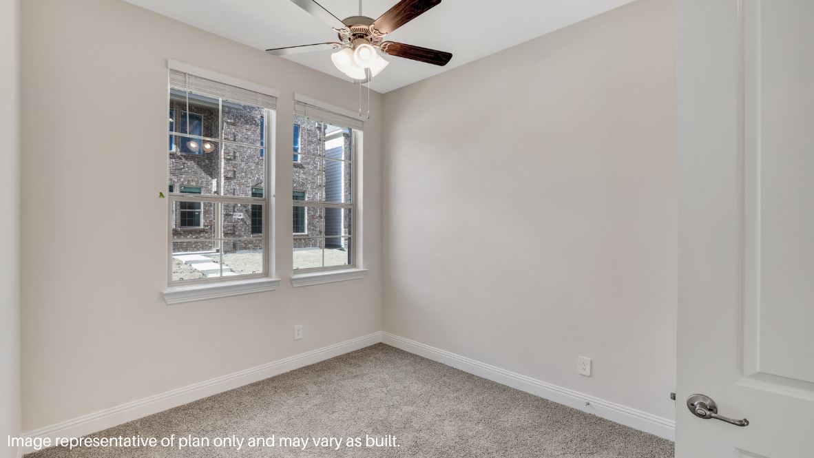 The main-floor bedroom with an en-suite bath is perfect for guests