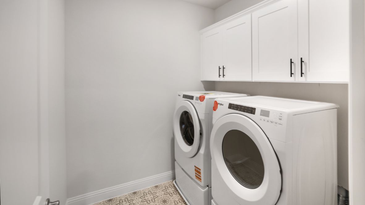 laundry room with side by side washer and dryer