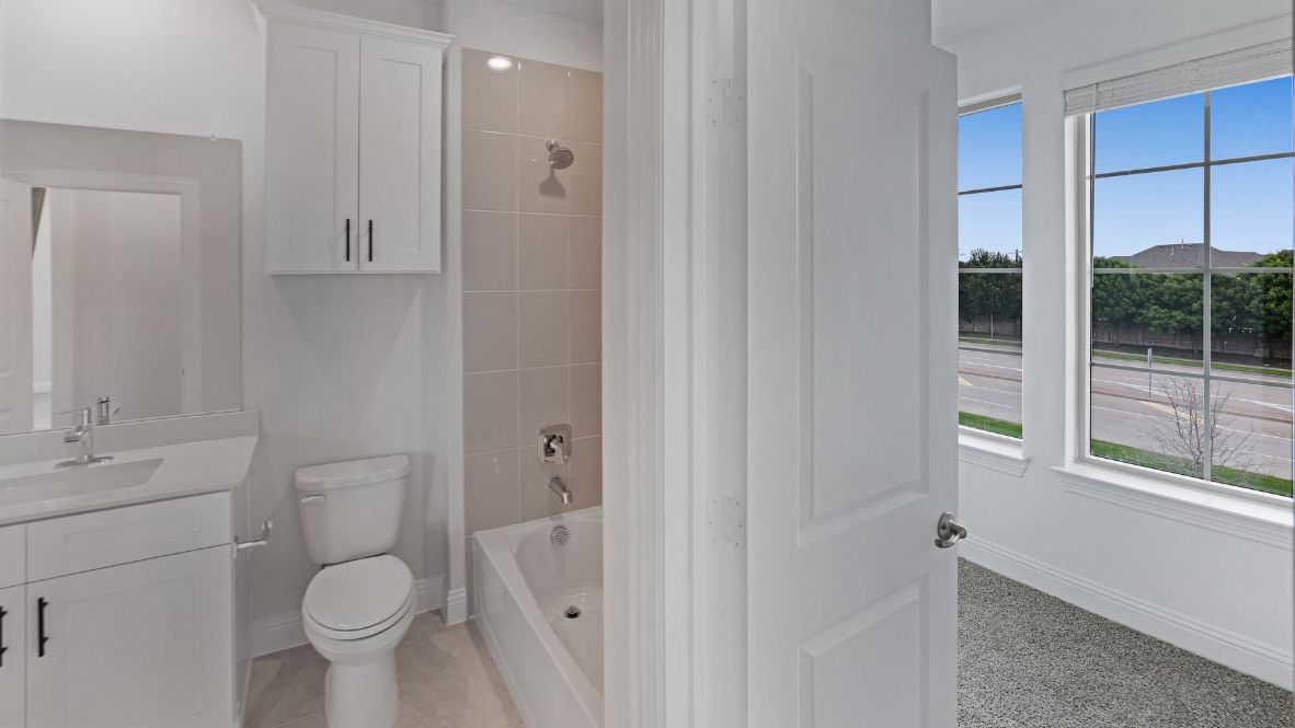 spacious walk in closet off of the bathroom