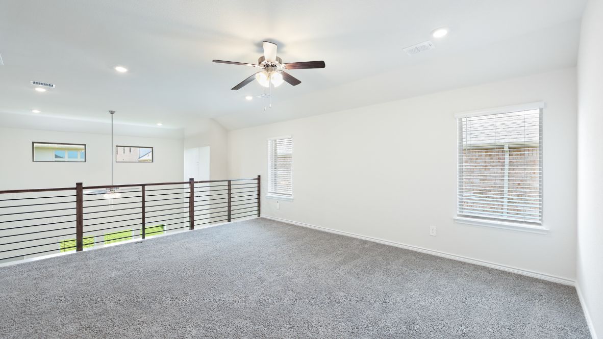 The Burrow is one of our two-story floorplans featured at our Hidden Lakes community in McKinney, TX. The Burrow offers an impressive 2,560 sq. ft. of living space across 4 bedrooms, 3 bathrooms, and a 2-car garage.  As you walk through the long foyer to the open layout of the home, you will find the large kitchen that is open to the spacious family room and dining area. The soaring ceilings in the living room are sure to grab your attention. The kitchen features granite or quartz countertops, decorative tile backsplash, stainless steel appliances and a large kitchen island.  The main bedroom, bedroom 1, is located downstairs and features a large walk in shower and huge walk in closet. Upstairs you will find a large loft that is open to the living room below. Utilize this space as a media room, game room, or home gym.  This home comes included with a professionally designed landscape package and a full irrigation system as well as our Home is Connected® base package that offers devices such as offers devices such as the Amazon Echo Pop, a Video Doorbell, Deako Smart Light Switch, a Honeywell Thermostat, and more.  Images are representative of plan and may vary as built.  Contact us today and find your home at Hidden Lakes.