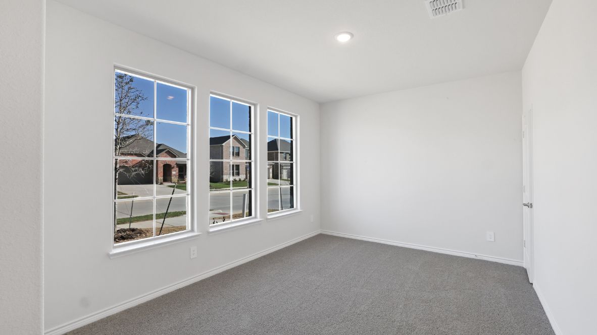Bedroom with large windows
