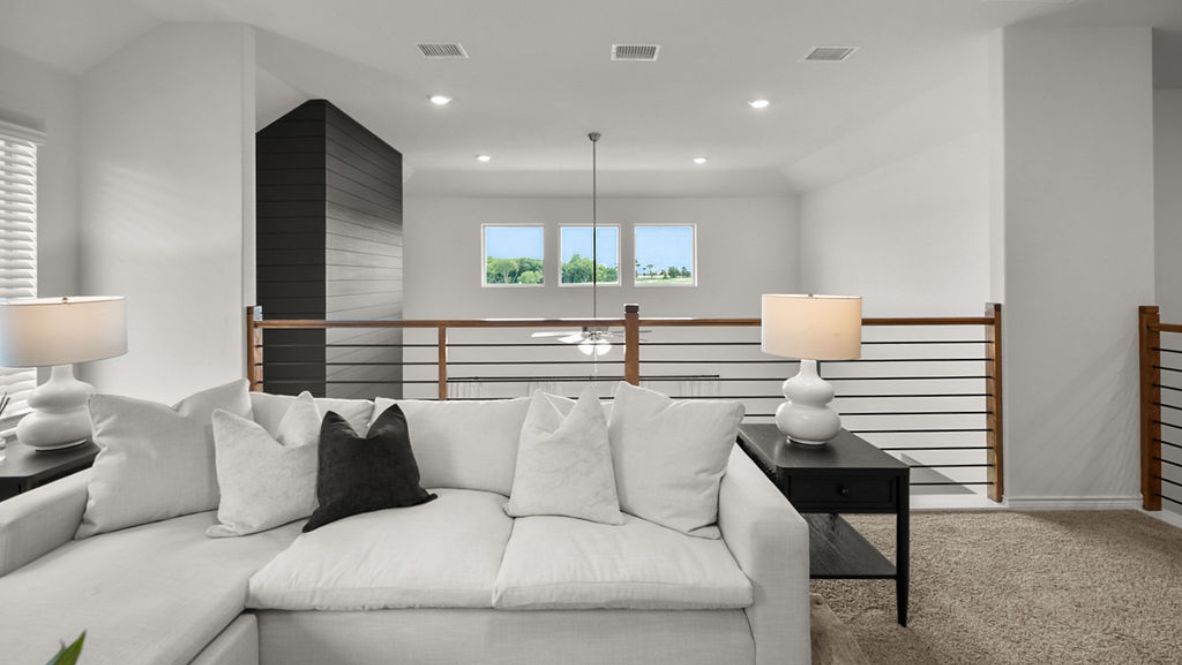 Second story living area overlooking first floor living area.