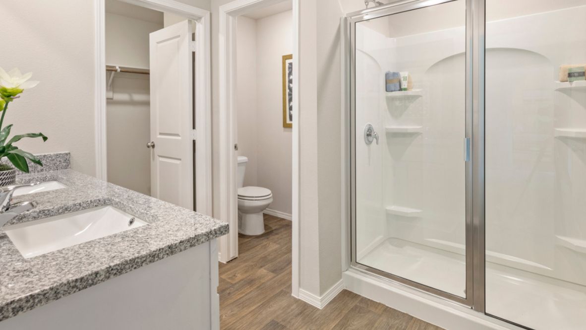 Welcome to the Brook Chase community in Broken Arrow, Oklahoma, where the Elgin floor plan epitomizes modern comfort and style. As you stroll down the streets lined with brick or brick and rock exterior elevations, you'll feel right at home in this friendly neighborhood.  The Elgin offers 1614 square feet of well-designed living space, featuring 4 bedrooms and 2 bathrooms, making it perfect for families seeking both functionality and charm. Step inside and be greeted by an open-concept layout, where the kitchen seamlessly overlooks the combination living and dining area.  Designed for both aesthetics and practicality, the kitchen boasts painted cabinetry, granite countertops, and luxury vinyl wood flooring. Meanwhile, the primary and secondary bathrooms feature timeless subway tile surround, creating a spa-like atmosphere for your daily routines. With carpeted floors in the bedrooms, comfort is never compromised.  Retreat to the primary bedroom, where relaxation awaits. Enjoy the convenience of an attached bathroom with a walk-in closet, double vanity, and a separate toilet for added privacy. Say goodbye to morning sink-sharing woes - the Elgin ensures ample space for everyone to get ready with ease.  Don't miss your chance to make the Elgin your new home in the Brook Chase community. Contact us today to schedule a tour and discover why this floor plan is the perfect blend of style and functionality for your family's needs. Your dream home awaits!