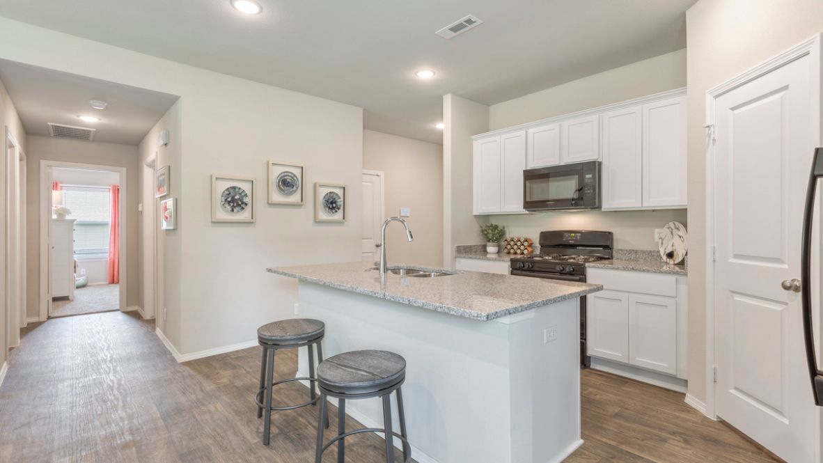 Welcome to the Brook Chase community in Broken Arrow, Oklahoma, where the Elgin floor plan epitomizes modern comfort and style. As you stroll down the streets lined with brick or brick and rock exterior elevations, you'll feel right at home in this friendly neighborhood.  The Elgin offers 1614 square feet of well-designed living space, featuring 4 bedrooms and 2 bathrooms, making it perfect for families seeking both functionality and charm. Step inside and be greeted by an open-concept layout, where the kitchen seamlessly overlooks the combination living and dining area.  Designed for both aesthetics and practicality, the kitchen boasts painted cabinetry, granite countertops, and luxury vinyl wood flooring. Meanwhile, the primary and secondary bathrooms feature timeless subway tile surround, creating a spa-like atmosphere for your daily routines. With carpeted floors in the bedrooms, comfort is never compromised.  Retreat to the primary bedroom, where relaxation awaits. Enjoy the convenience of an attached bathroom with a walk-in closet, double vanity, and a separate toilet for added privacy. Say goodbye to morning sink-sharing woes - the Elgin ensures ample space for everyone to get ready with ease.  Don't miss your chance to make the Elgin your new home in the Brook Chase community. Contact us today to schedule a tour and discover why this floor plan is the perfect blend of style and functionality for your family's needs. Your dream home awaits!