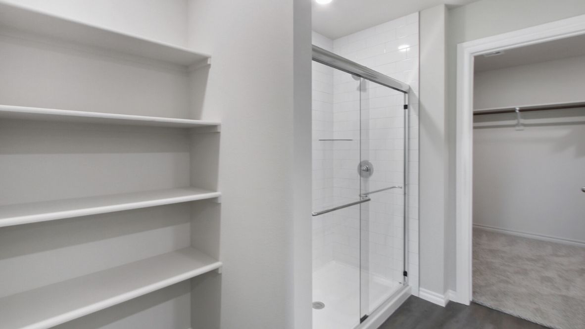 Welcome to the Denton floor plan, where modern charm meets cozy elegance in the heart of The Conrad Village Community, nestled in scenic Bixby, Oklahoma. This one-story haven offers 3 bedrooms, 2 baths, and a generous 1575 square feet of living space, perfect for those seeking a warm and inviting retreat.  From the outside, admire the traditional brick or brick and rock exterior, exuding timeless allure and modern curb appeal. Step inside to discover an open concept layout that effortlessly combines style and functionality. The kitchen features painted white shaker-style cabinets, granite countertops, and stainless steel appliances, creating a welcoming atmosphere that overlooks the dining area and living room, ideal for gatherings and entertaining.  As you explore further, you'll find comfort in every corner. Sink your feet into plush carpeting in the bedrooms, while the main living areas and halls boast durable luxury vinyl wood flooring, adding a touch of rustic charm to your everyday life. Indulge in the luxury of the primary suite, complete with a dual vanity, huge walk-in closet, separate water closet, and a large walk-in shower, ensuring your comfort and convenience.  Experience the convenience of smart home features included in every Denton floor plan. Schedule a tour today and discover your perfect blend of modern luxury and cozy warmth at The Conrad Village Community in Bixby, Oklahoma.