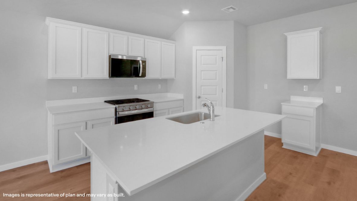 Conrad Village kitchen island with sink, pantry, storage, and new appliance suite included Conrad Village