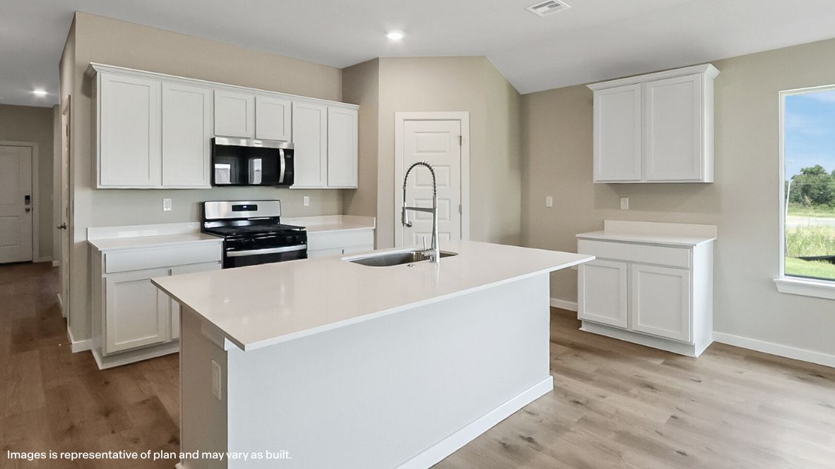 Central kitchen island with sink, storage, and multi-prep space for everyday life