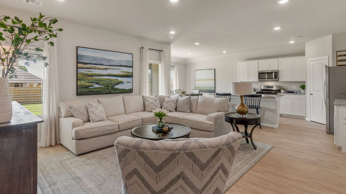 Welcome to Hawks Landing, where the Dean floor plan sets the standard for luxury and comfort in our prestigious new home community. From its grand brick and rock exterior to its professionally landscaped yard adorned with a mature tree in the front, this home boasts curb appeal that leaves a lasting impression.  Step inside to discover an inviting haven adorned with grand ceilings and an abundance of natural light that fills the space. The gourmet kitchen is a chef's dream, featuring white painted shaker style cabinets, granite countertops, and a generously-sized island perfect for hosting holiday gatherings or casual meals with loved ones. Indulge in luxury with luxury vinyl wood-look flooring throughout, offering both durability and timeless appeal. Retreat to the spa-like bathrooms, featuring a lavish walk-in shower with a full glass enclosure and 12x24 timeless marble tile surrounds in all showers.  Enjoy outdoor living to the fullest with a covered patio perfect for relaxing and entertaining. Plus, experience the convenience of smart home features and the sustainability of energy-efficient systems, ensuring your home is both technologically advanced and environmentally friendly.  Don't miss the opportunity to make the Dean floor plan your own. Contact us today and embark on the journey to your dream home in Hawks Landing.