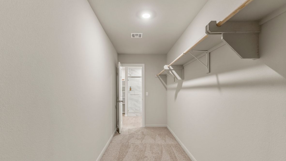 Welcome to Hawks Landing, where the Dean floor plan sets the standard for luxury and comfort in our prestigious new home community. From its grand brick and rock exterior to its professionally landscaped yard adorned with a mature tree in the front, this home boasts curb appeal that leaves a lasting impression.  Step inside to discover an inviting haven adorned with grand ceilings and an abundance of natural light that fills the space. The gourmet kitchen is a chef's dream, featuring white painted shaker style cabinets, granite countertops, and a generously-sized island perfect for hosting holiday gatherings or casual meals with loved ones. Indulge in luxury with luxury vinyl wood-look flooring throughout, offering both durability and timeless appeal. Retreat to the spa-like bathrooms, featuring a lavish walk-in shower with a full glass enclosure and 12x24 timeless marble tile surrounds in all showers.  Enjoy outdoor living to the fullest with a covered patio perfect for relaxing and entertaining. Plus, experience the convenience of smart home features and the sustainability of energy-efficient systems, ensuring your home is both technologically advanced and environmentally friendly.  Don't miss the opportunity to make the Dean floor plan your own. Contact us today and embark on the journey to your dream home in Hawks Landing.