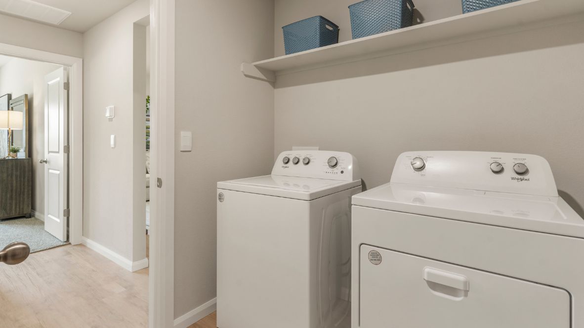 Welcome to Hawks Landing, where the Dean floor plan sets the standard for luxury and comfort in our prestigious new home community. From its grand brick and rock exterior to its professionally landscaped yard adorned with a mature tree in the front, this home boasts curb appeal that leaves a lasting impression.  Step inside to discover an inviting haven adorned with grand ceilings and an abundance of natural light that fills the space. The gourmet kitchen is a chef's dream, featuring white painted shaker style cabinets, granite countertops, and a generously-sized island perfect for hosting holiday gatherings or casual meals with loved ones. Indulge in luxury with luxury vinyl wood-look flooring throughout, offering both durability and timeless appeal. Retreat to the spa-like bathrooms, featuring a lavish walk-in shower with a full glass enclosure and 12x24 timeless marble tile surrounds in all showers.  Enjoy outdoor living to the fullest with a covered patio perfect for relaxing and entertaining. Plus, experience the convenience of smart home features and the sustainability of energy-efficient systems, ensuring your home is both technologically advanced and environmentally friendly.  Don't miss the opportunity to make the Dean floor plan your own. Contact us today and embark on the journey to your dream home in Hawks Landing.